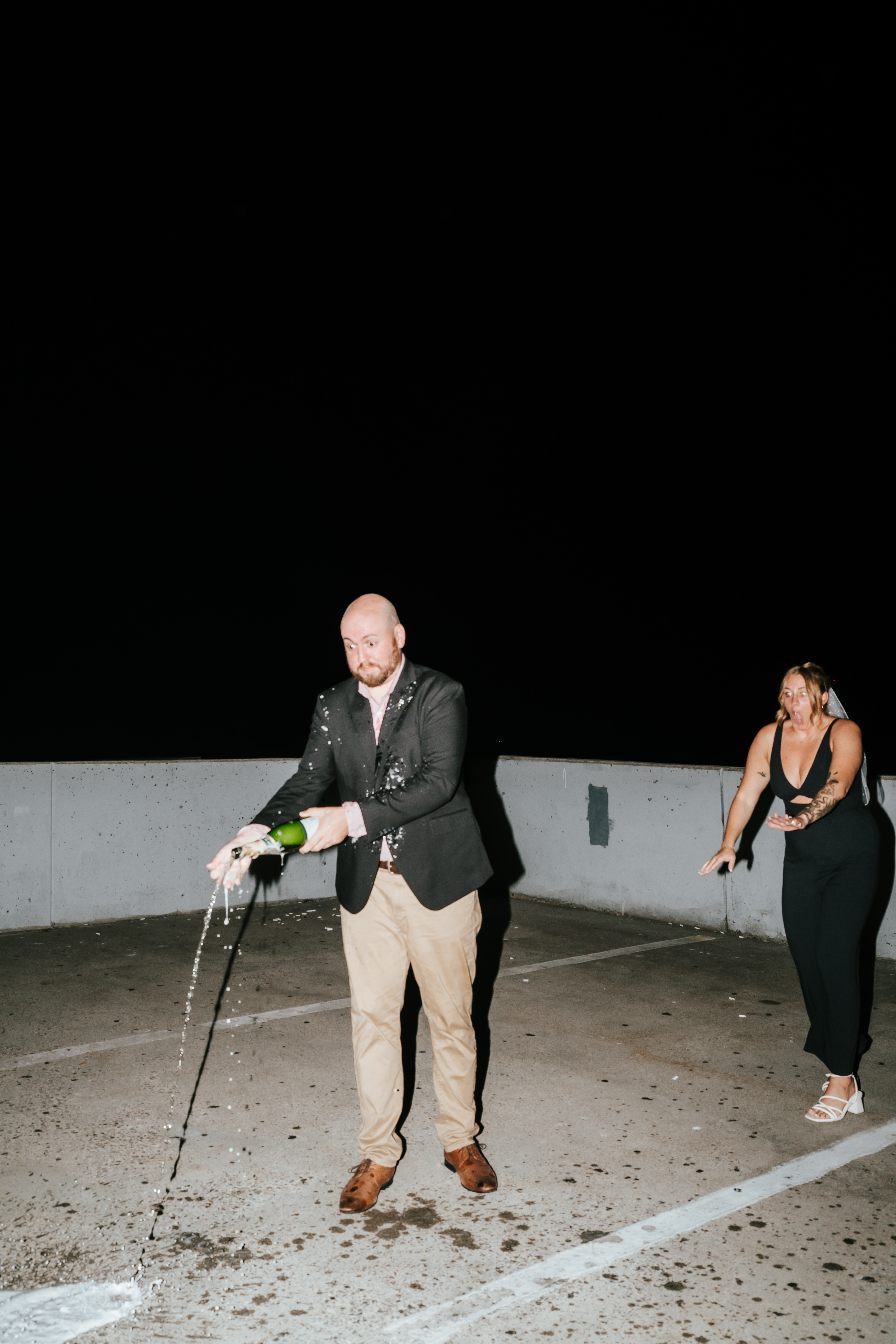 Direct Flash Rooftop Engagement Photos Maryland Wedding Photographer champagne pop gone wrong