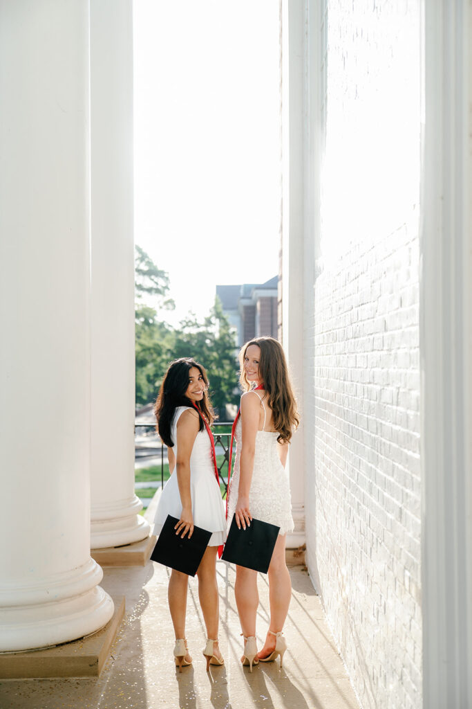 University of Maryland candid graduation photographer helping grads feel comfortable and excited during their photoshoot