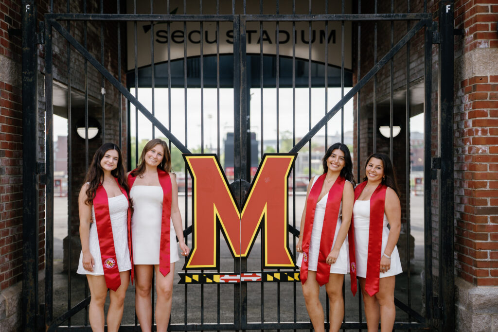 Graduation photos at SECU Stadium gate at The University of Maryland
